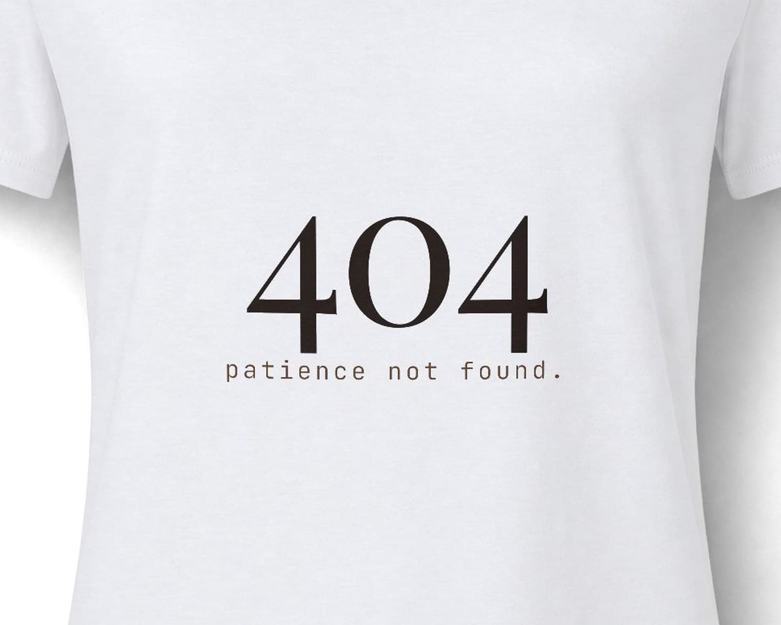 Close up of the chest print on the 404 patience not found, in white tee